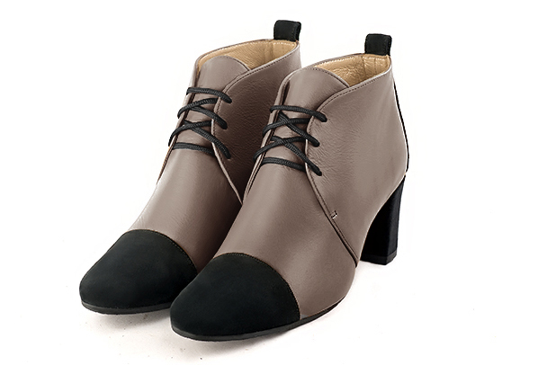 Matt black and bronze beige women's ankle boots with laces at the front. Round toe. Medium block heels. Front view - Florence KOOIJMAN